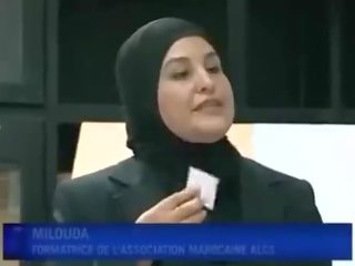 Arab young female puts kondom from mouth